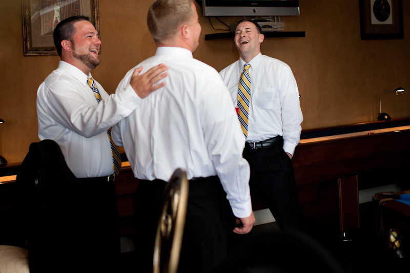 groomsmen laughing getting ready