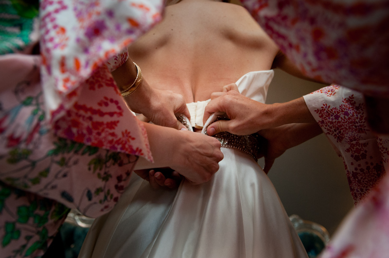 ziping up brides dress