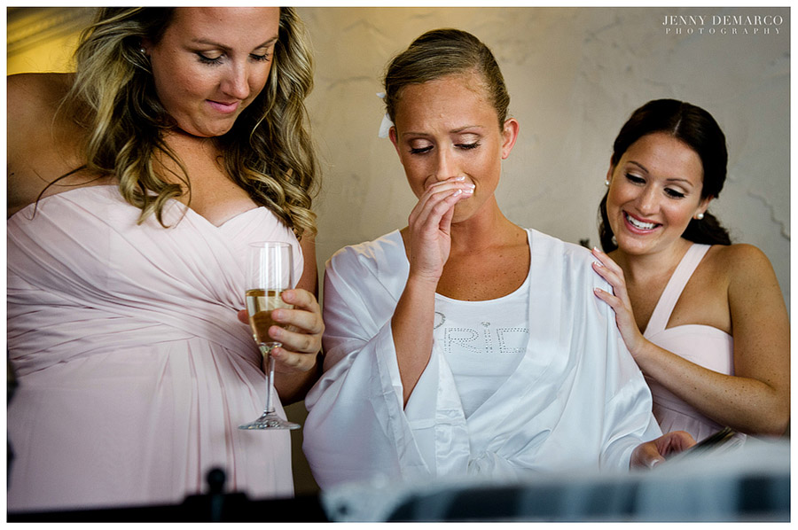 The bridesmaids and bride prepare for the wedding ceremony at the Tuscan Style venue.