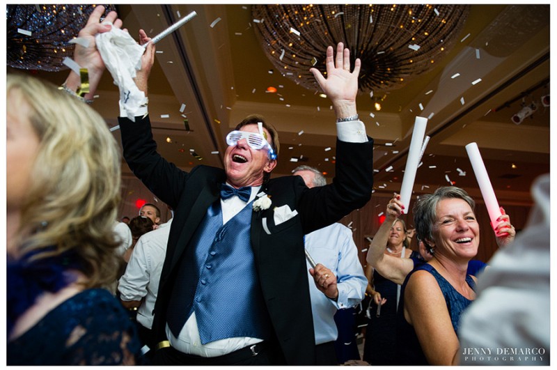 Guests enjoy a confetti shower on the dancefloor in the formal ballroom at the Four Seasons Hotel in Austin, Texas.