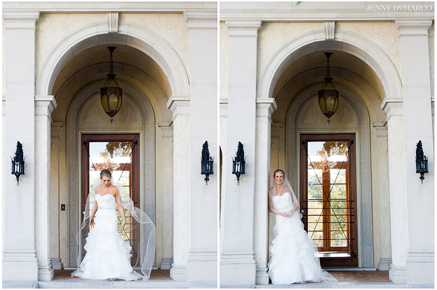 Bride stands under the mediterranean revival style home.