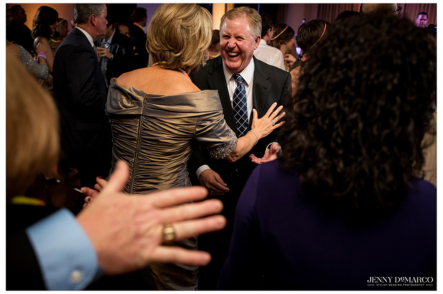 Guests dancing during wedding reception at Ridgewood Country Club. 