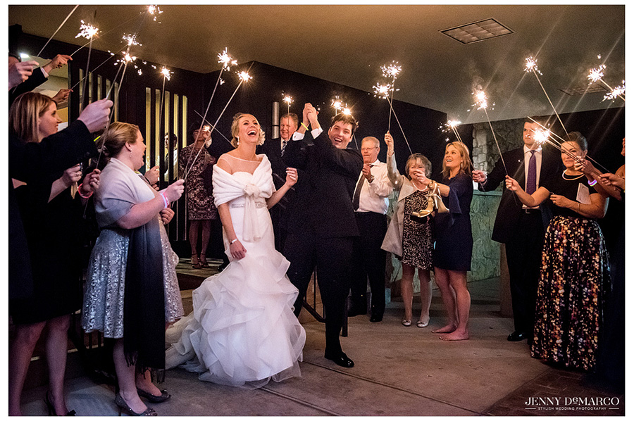 Bride and Groom exiting through sparklers.