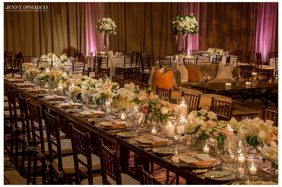 Flowers and candles line each table in the ballroom of the Four Seasons.