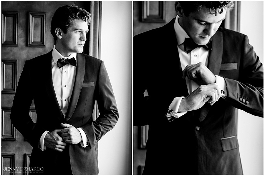 Black and white photo of the groom putting his tuxedo on before the wedding ceremony.