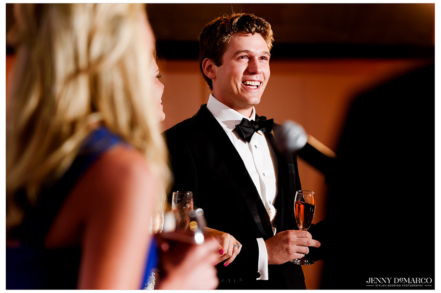 Best man gives a toast at the wedding reception. 