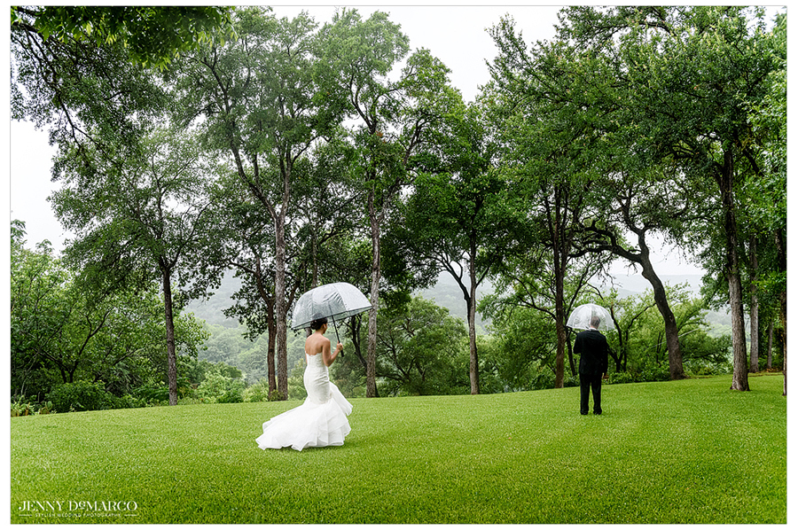 Bride faces grooms back outside in rain, seconds before reveal