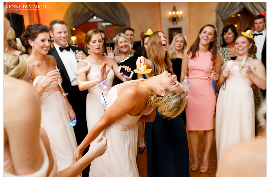 Bridesmaid bends over backwards on dance floor and draws a crowd 