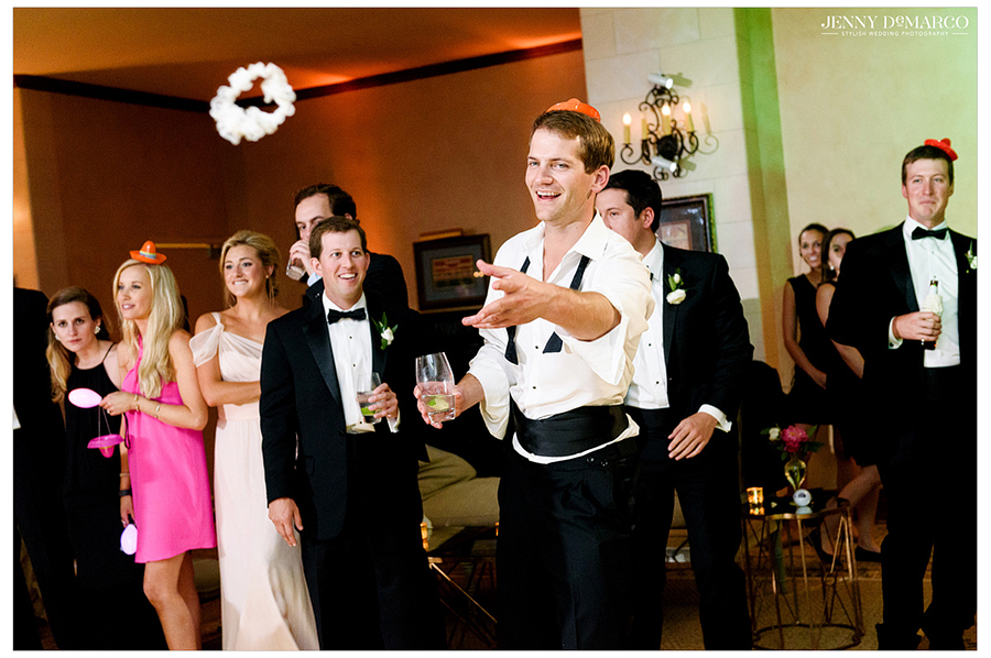 Grooms twin brother catches the garter 