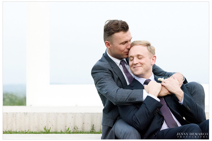 The grooms cuddle after the ceremony at Prospect House.