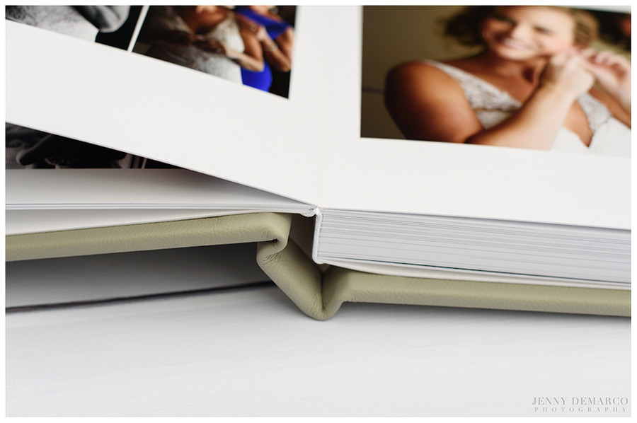 A view of the opened spine of the wedding album.