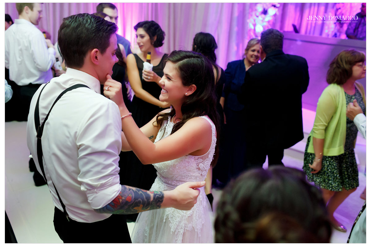 The bride and groom in an intimate moment on the dance floor.