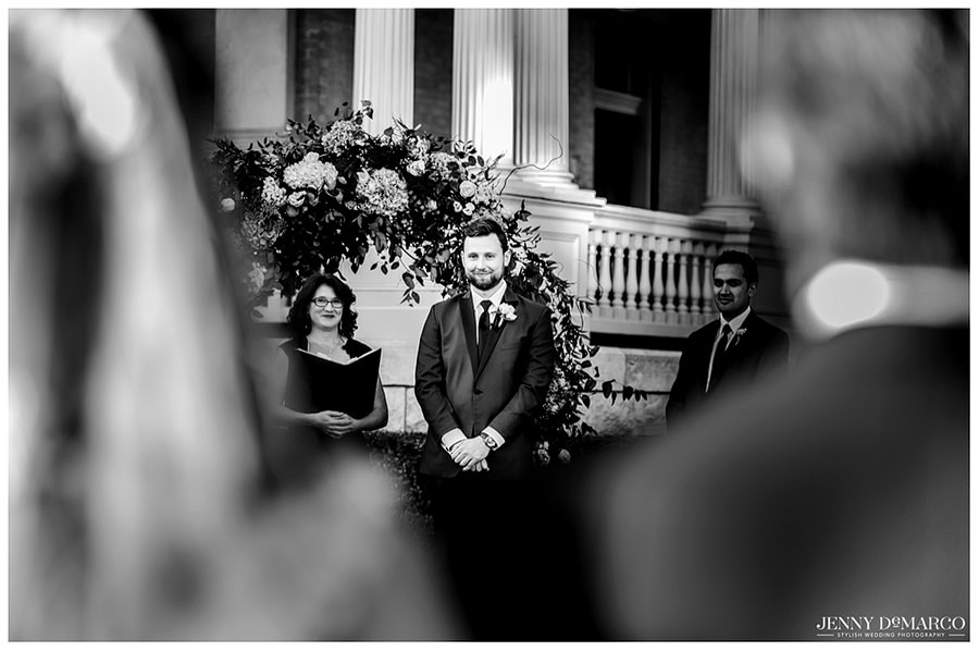 Groom seeing his future wife walking down the aisle for the first time at Hotel Ella in Austin, Texas.