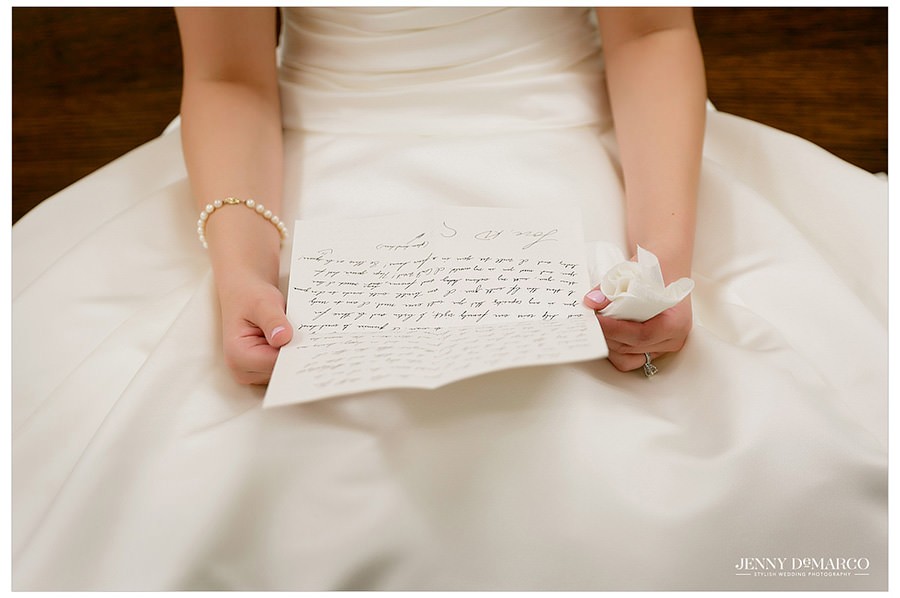 Bride reads letter from her groom