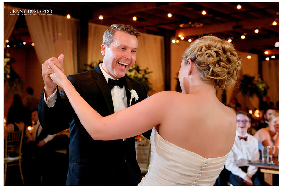 Bride dances with her father at the wedding reception