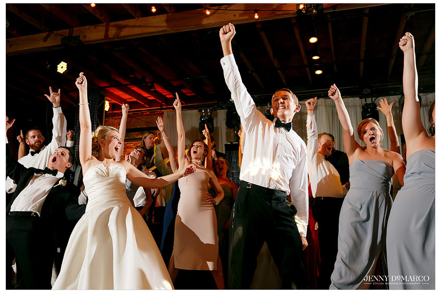 Wedding guests dance at reception