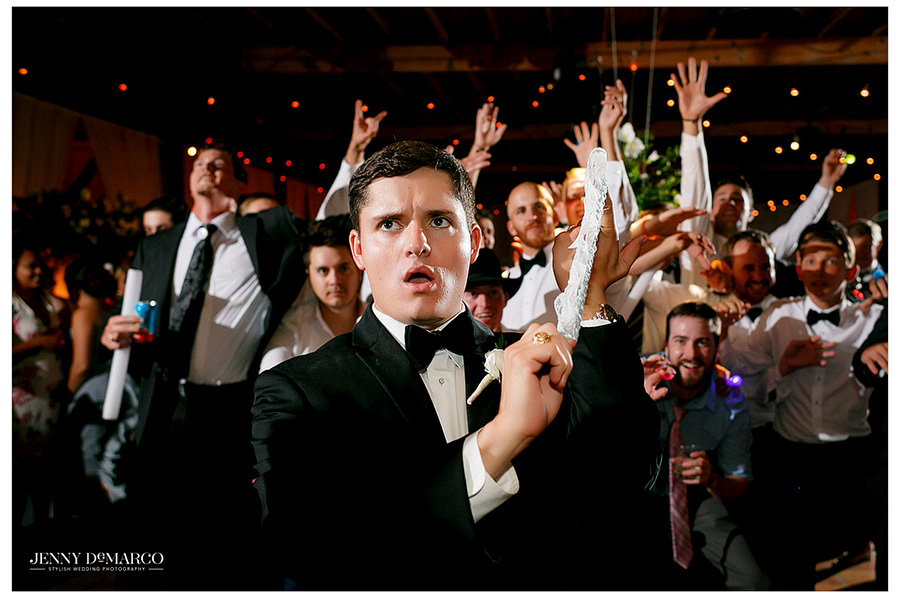 Garter toss at wedding reception