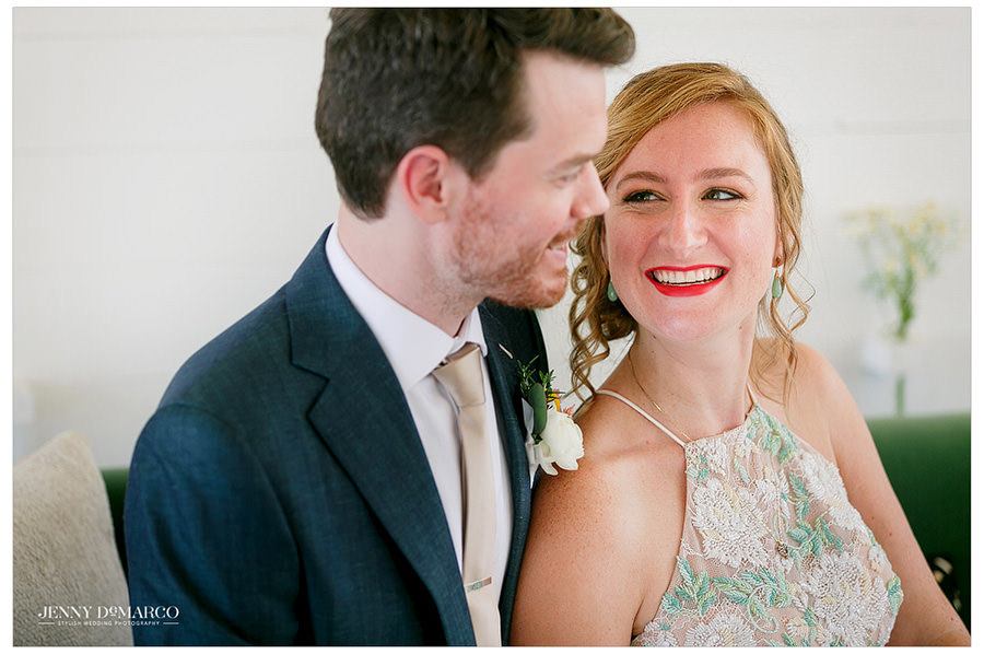 Bride smiles sweetly at her Groom before their reception