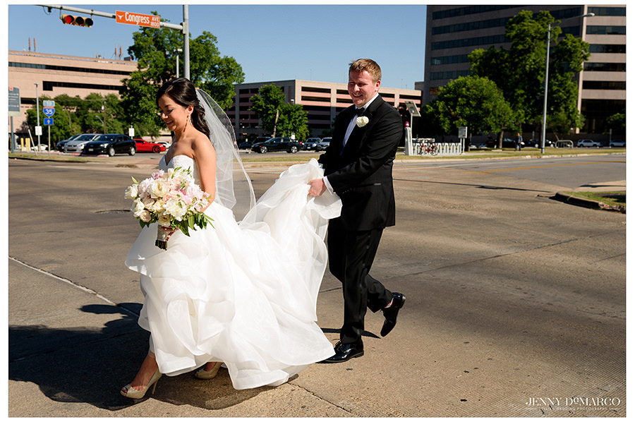 the bride and groom strutting down Congress