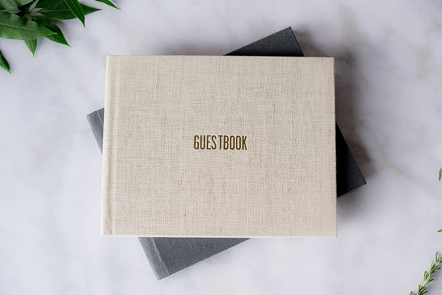 Photo guestbook with linen cover in "sand" and gold foil debossing