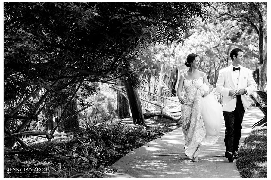 The couple takes a walk along a path at the Four Seasons.