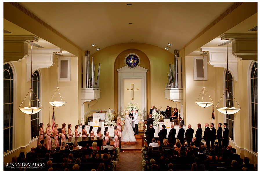 A wide angle shot of the church all of the members and guests.