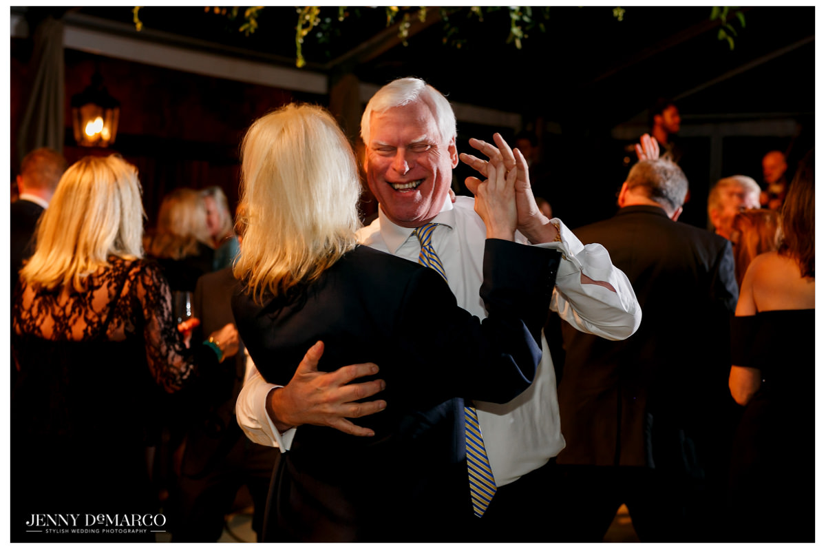 Guests take the dance floor and dance together.