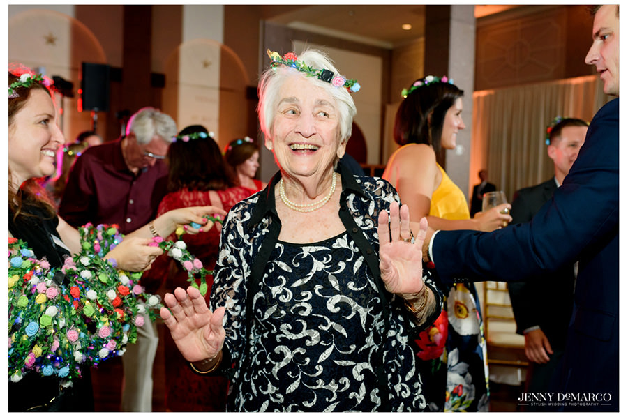Grandmother dancing and enjoying the reception