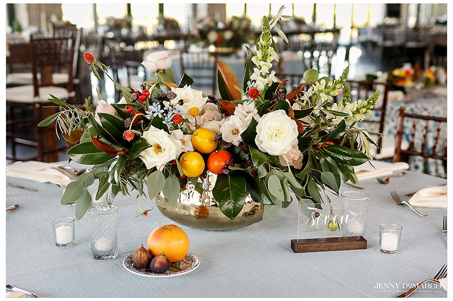 Flowers at the tables of the reception. 