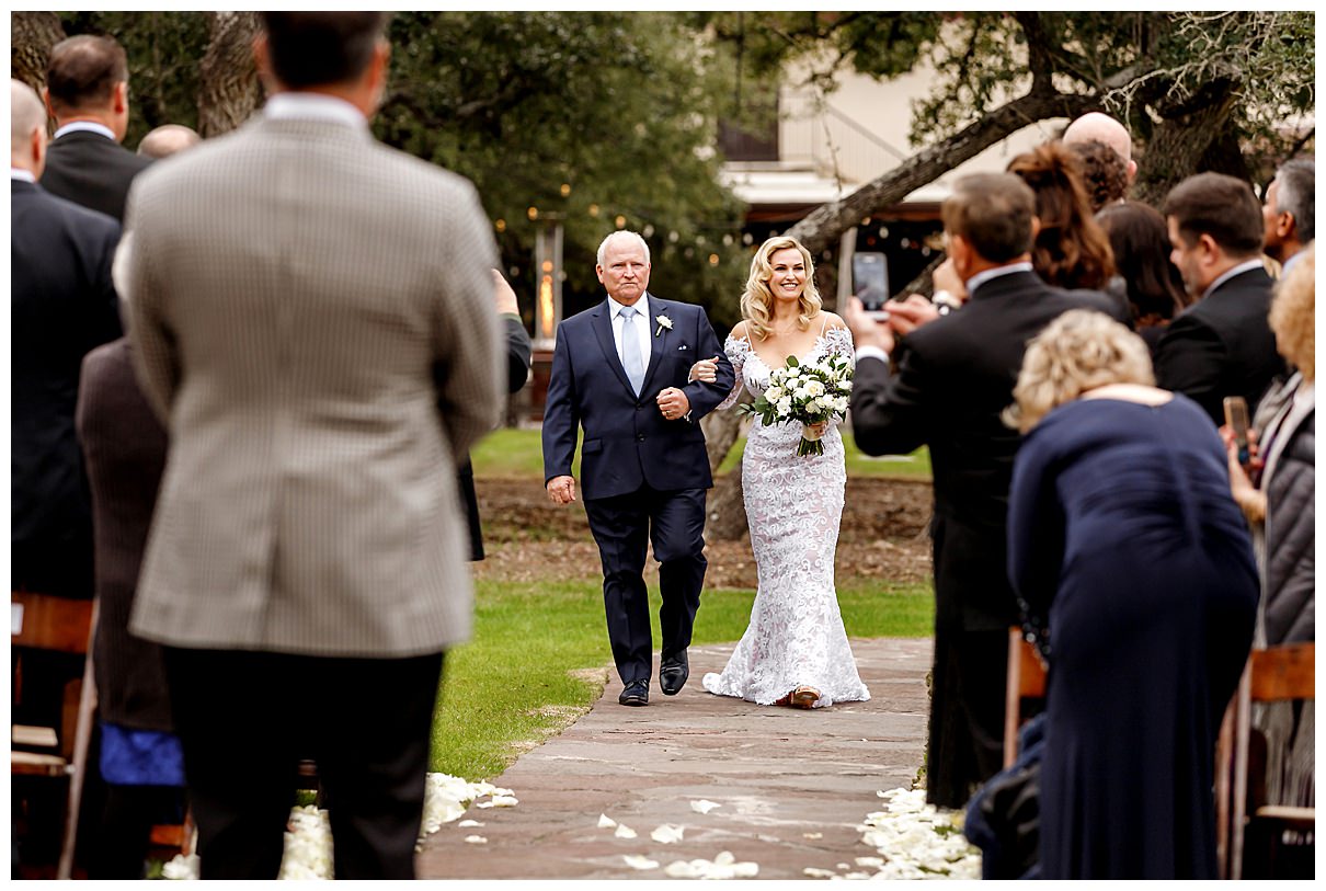 bride's father walking her down the aisle
