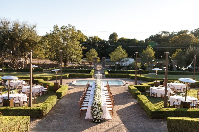 Outdoor dinner in the sunken European inspired formal gardens at Commodore Perry Estate