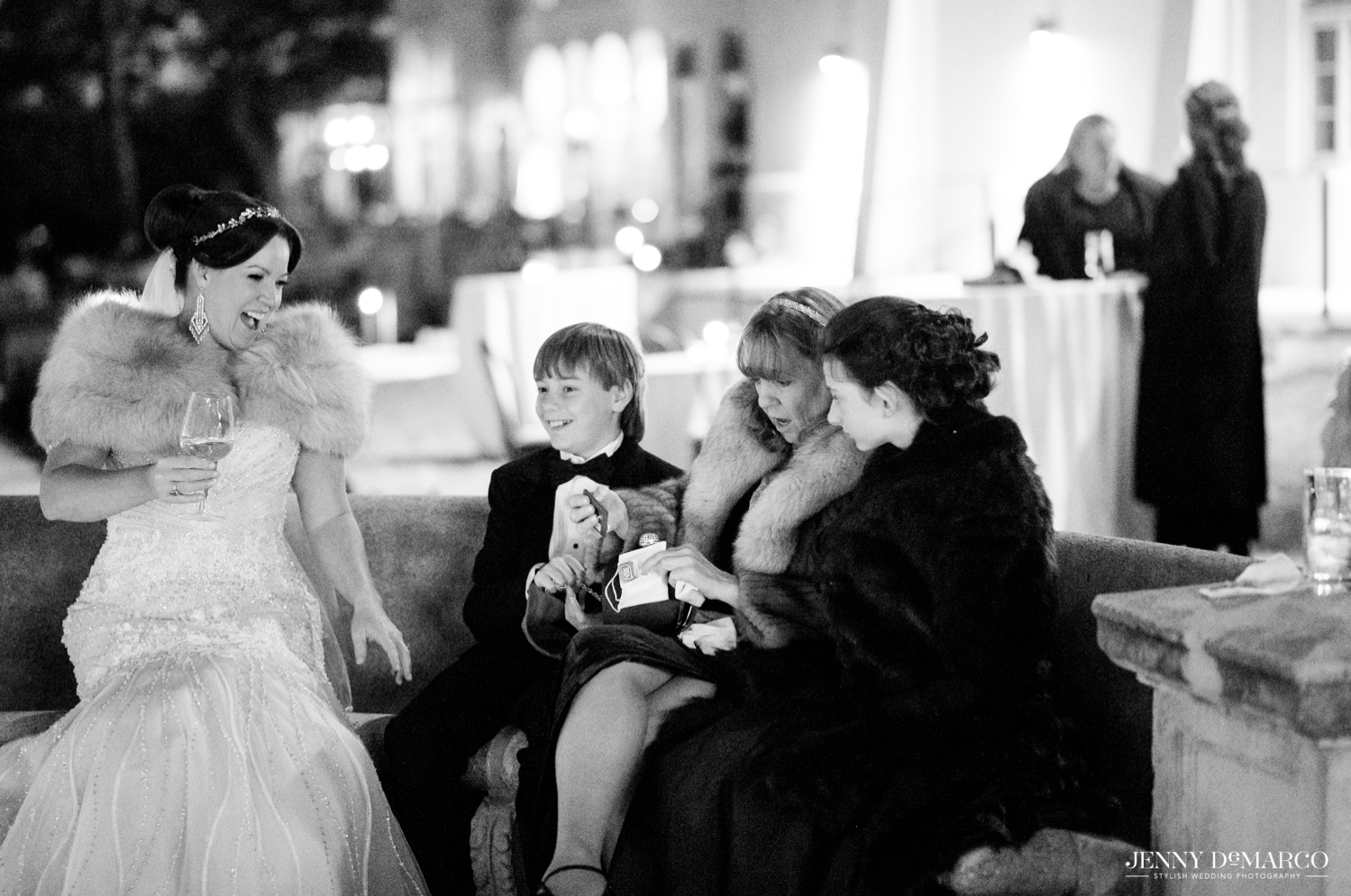 bride laughing with wedding guests