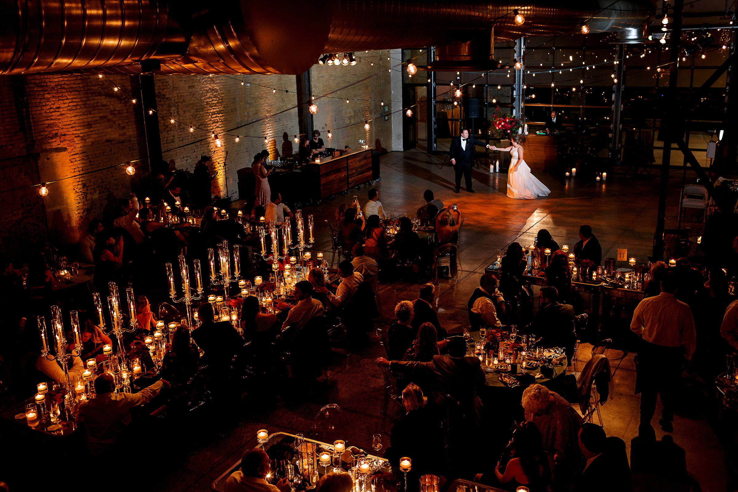 Bride and groom under lights at 800 congress