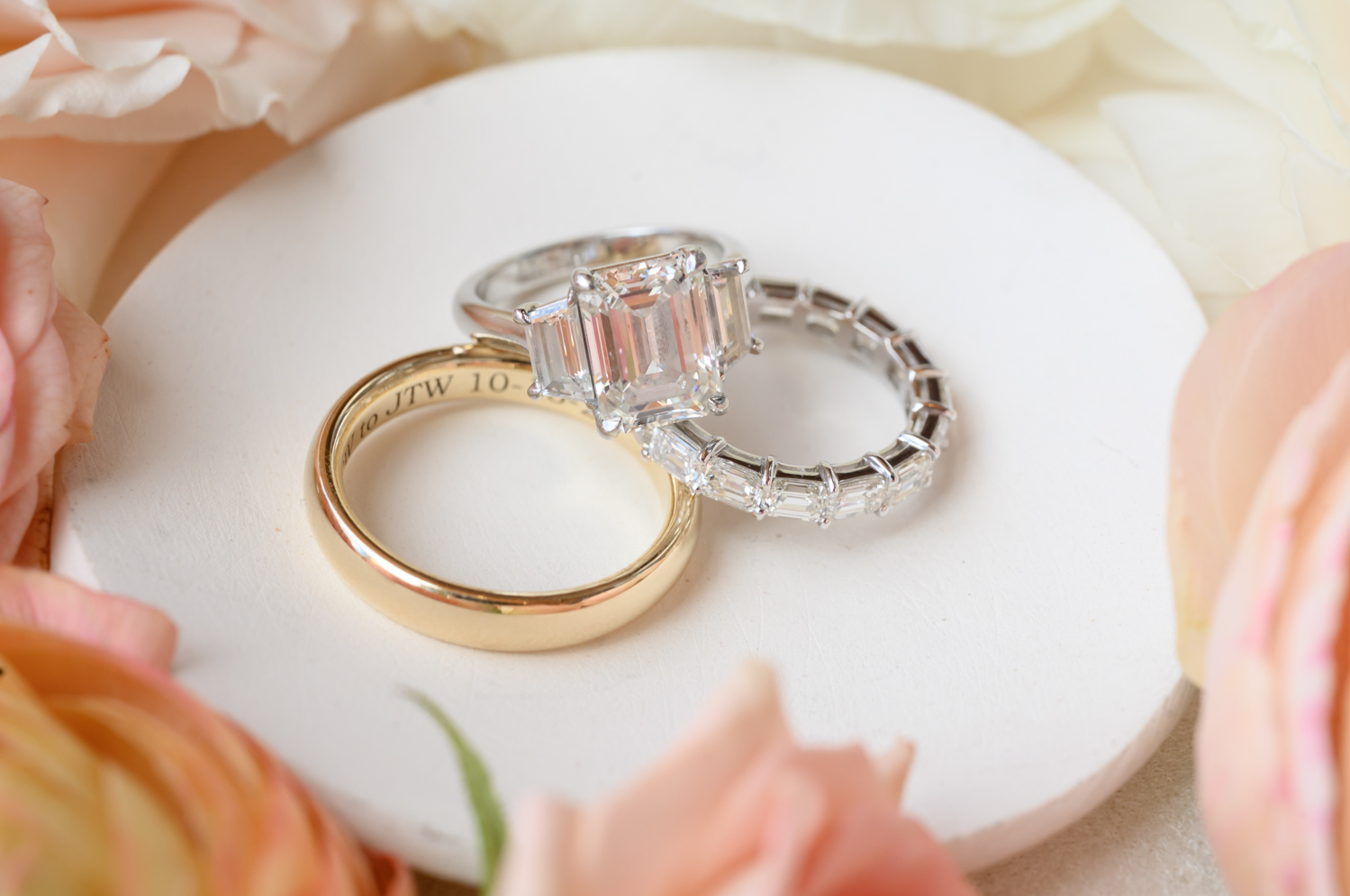 groom's wedding band, and bride's diamond engagement ring and wedding band 