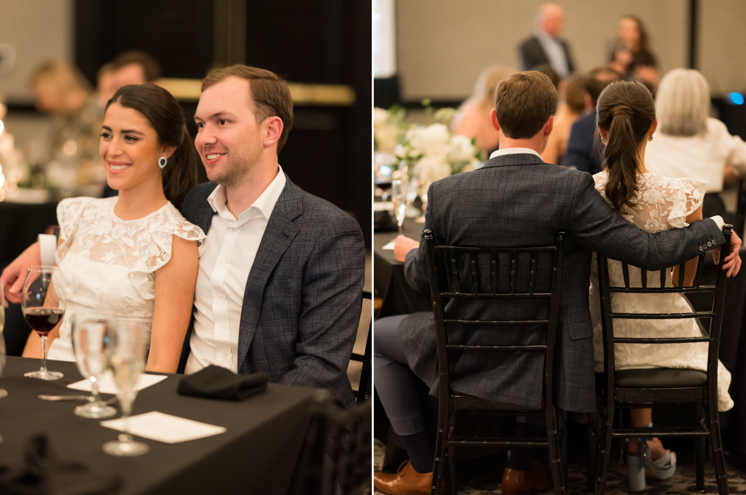 The bride and groom sit at their table at the rehearsal dinner, and the groom puts his arm around his bride