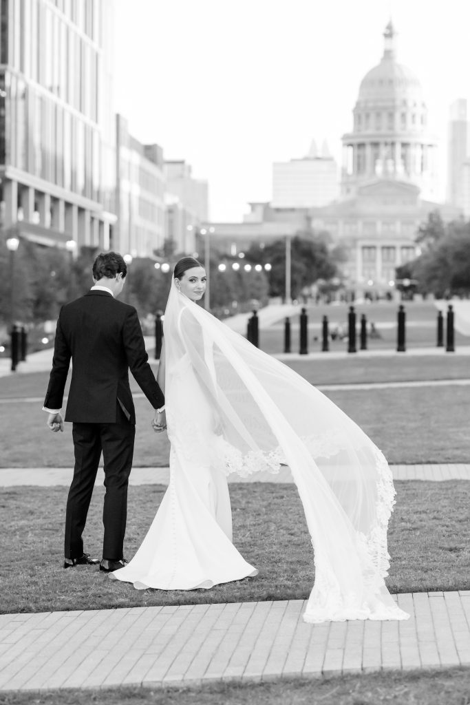 bride and groom portrait in front of the Texas Capitol