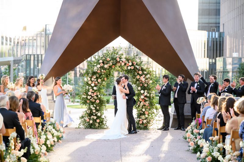 bride and groom kissing