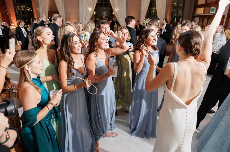 wedding guests dancing at the reception
