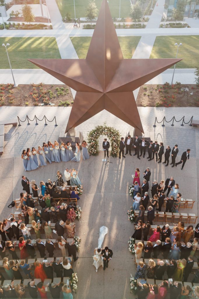 overhead shot of bride and groom walking back down the aisle