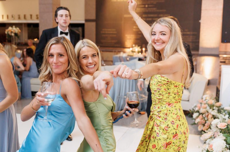 wedding guests dancing at the reception
