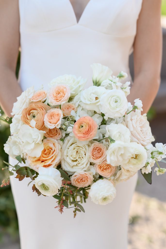 bridal bouquet with white and light orange florals