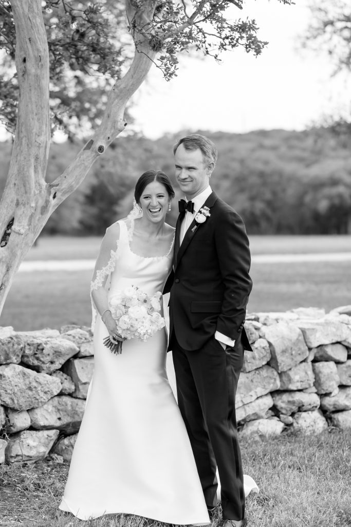 bride and groom laughing