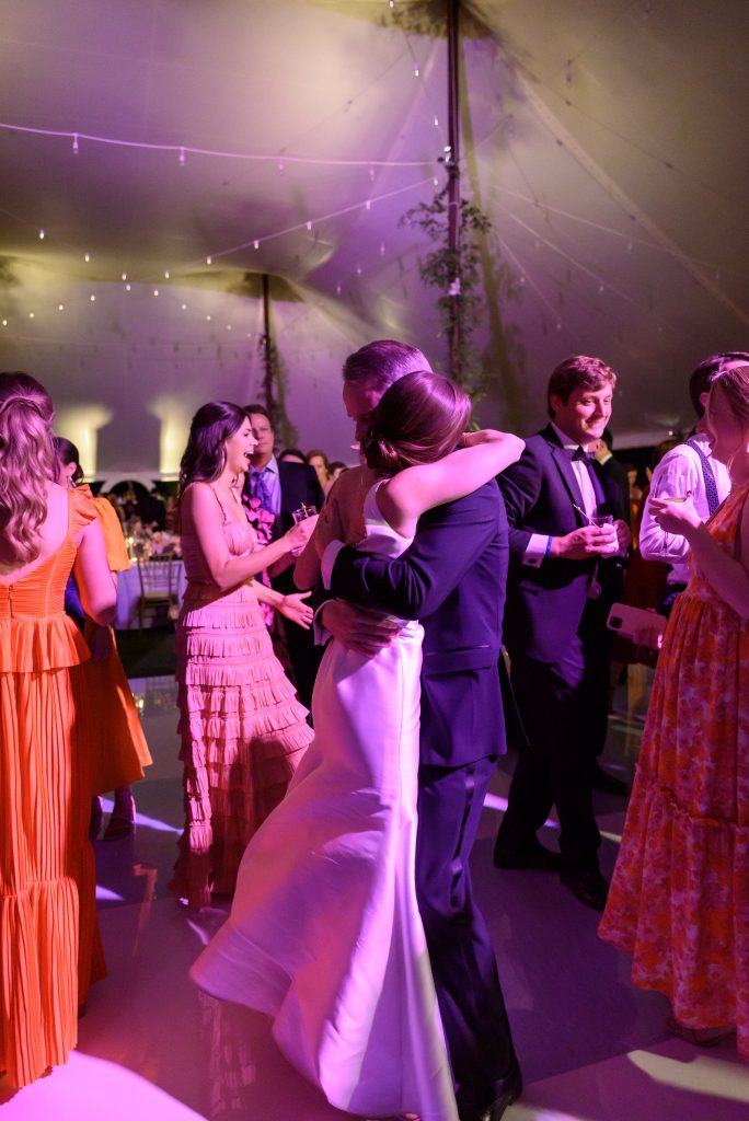 bride and groom dancing