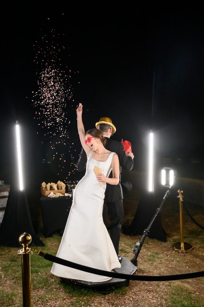 bride and groom in 360 Photo Booth