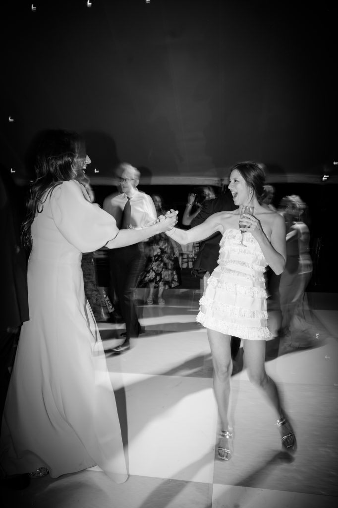 bride dancing with wedding guests