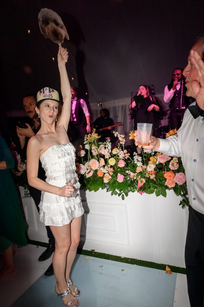 bride wearing spray paint hat