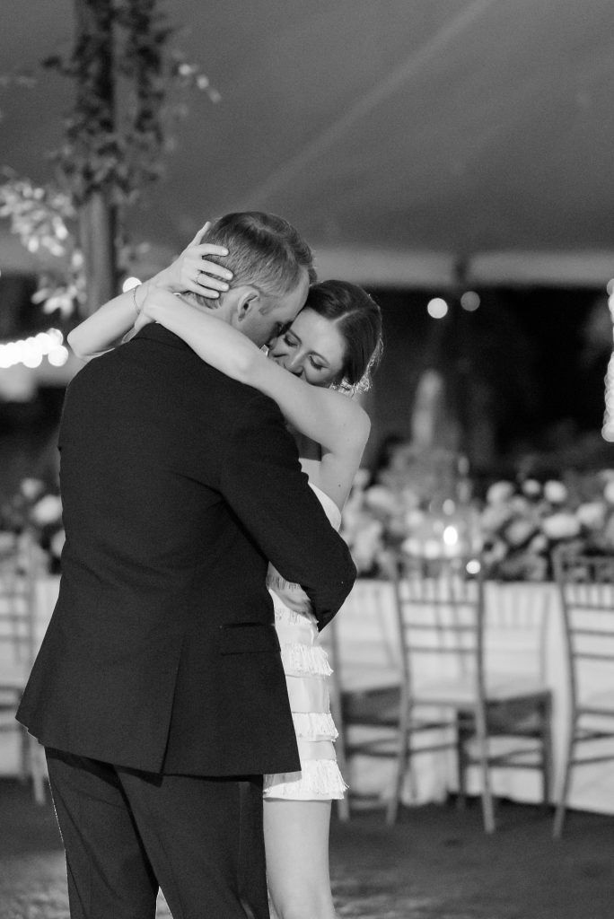 bride and groom dancing at the end of the night