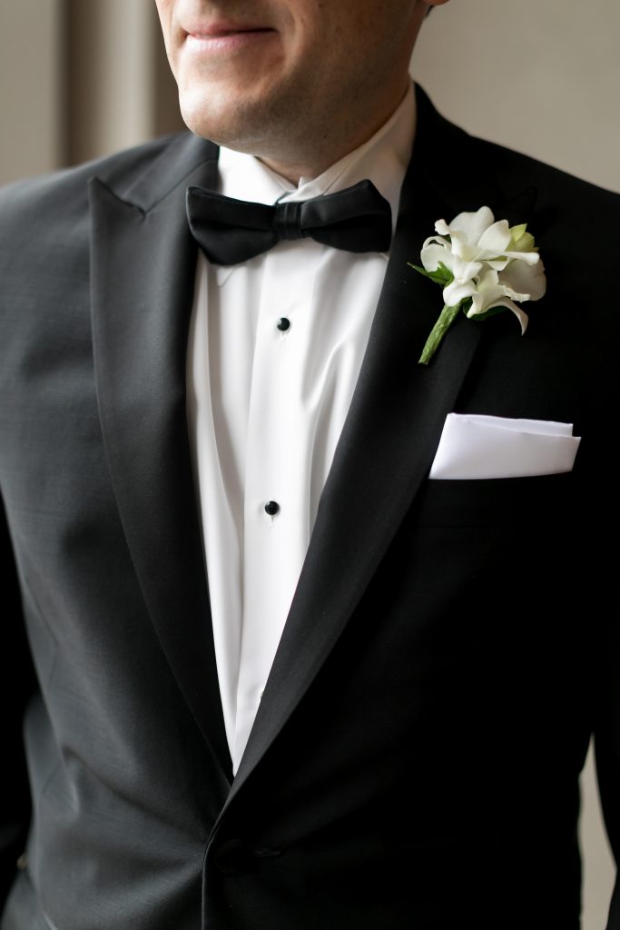 portrait of the groom in tuxedo