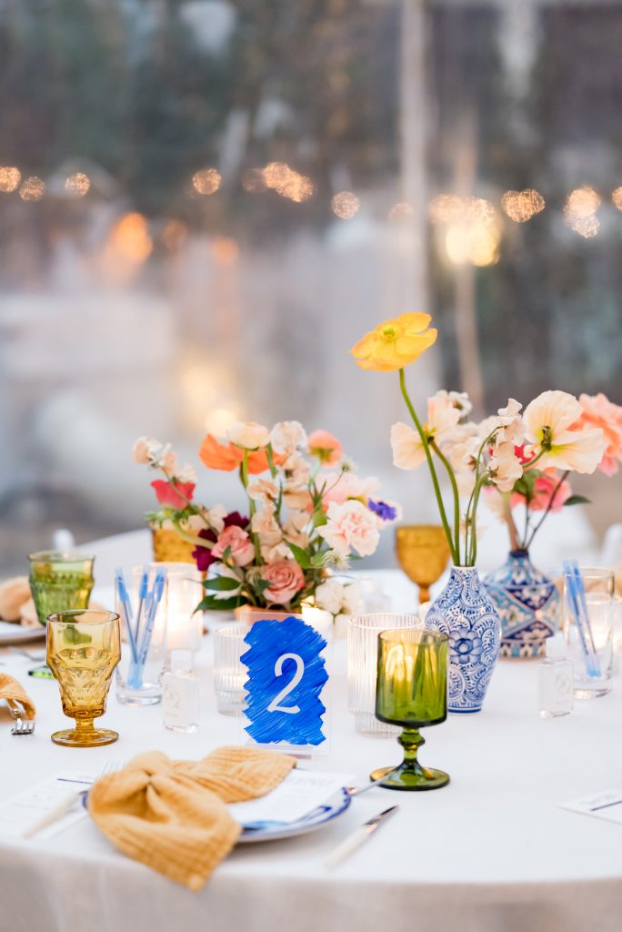 rehearsal dinner table setting with colorful accents