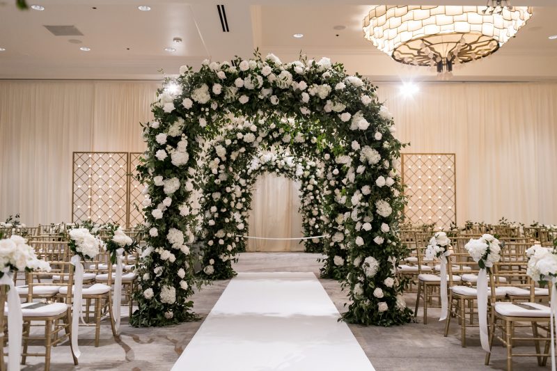 white floral arches